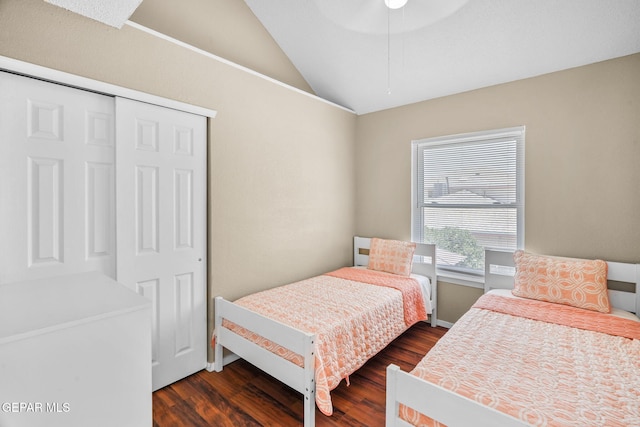 1640 Dennis Babjack Dr, El Paso, TX 79936 - bedroom with vaulted ceiling, dark wood-style flooring, a closet, baseboards, and ceiling fan