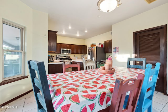 10819 Loma De Amor Ln, El Paso, TX 79934 - dining area featuring light tile patterned flooring, baseboards, and recessed lighting