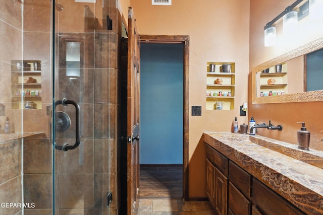 10819 Loma De Amor Ln, El Paso, TX 79934 - full bathroom featuring vanity and a stall shower