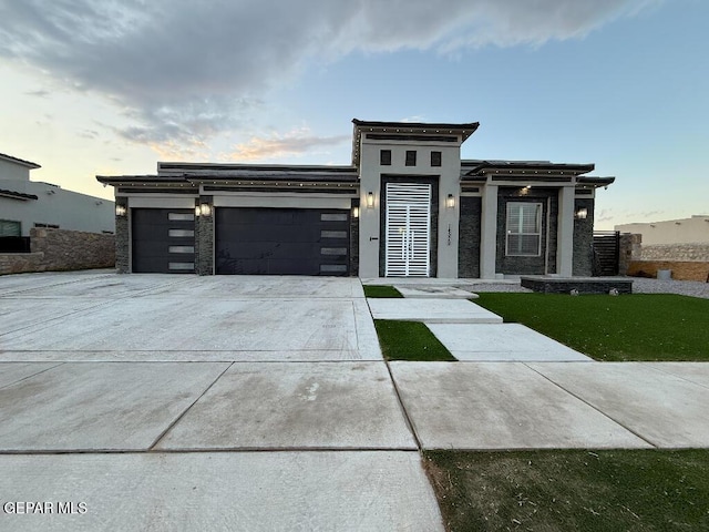 14529 Tierra Spring Ave, El Paso, TX 79938 - modern home featuring an attached garage and concrete driveway