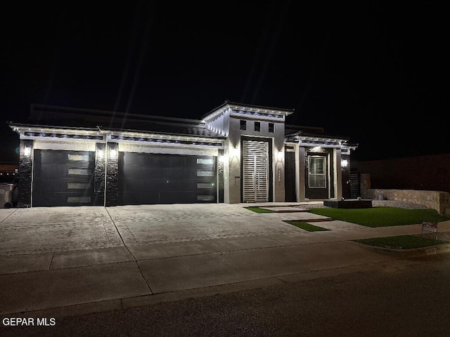 14529 Tierra Spring Ave, El Paso, TX 79938 - modern home with an attached garage and concrete driveway