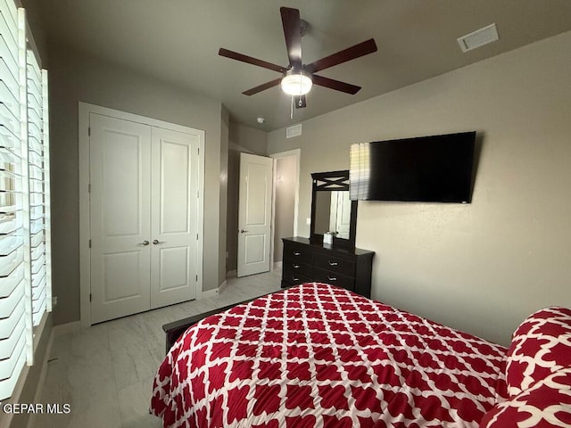 14529 Tierra Spring Ave, El Paso, TX 79938 - bedroom with baseboards, marble finish flooring, a closet, and a ceiling fan