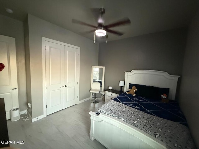 14529 Tierra Spring Ave, El Paso, TX 79938 - bedroom with baseboards, a closet, and ceiling fan