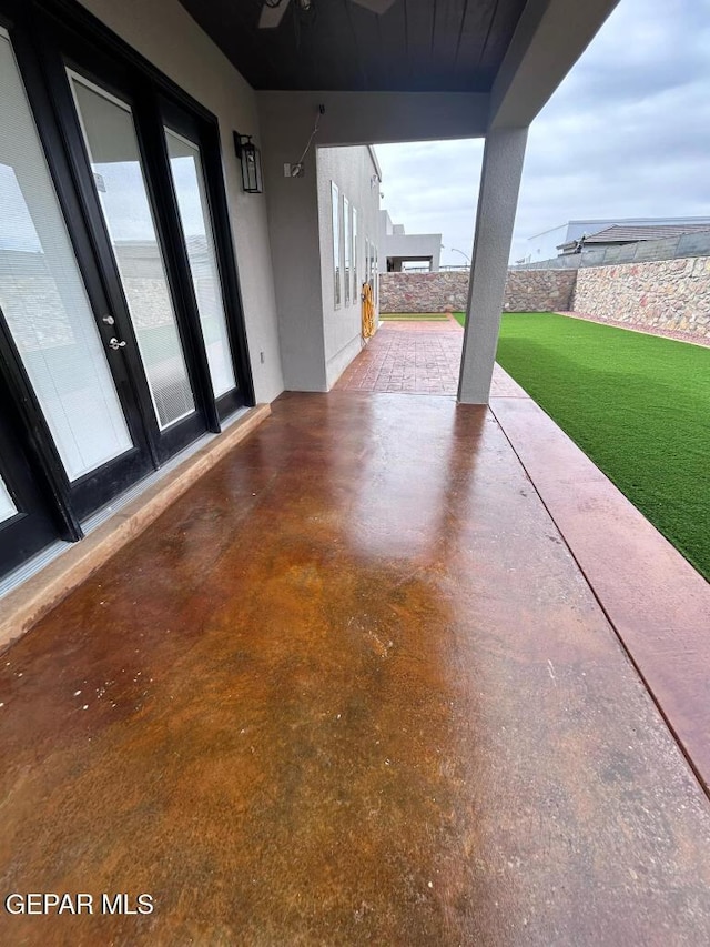 14529 Tierra Spring Ave, El Paso, TX 79938 - fenced backyard with a patio area and french doors