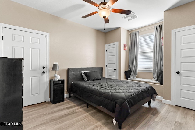 5505 Valley Cedar Dr, El Paso, TX 79932 - bedroom with light wood-type flooring, baseboards, and ceiling fan