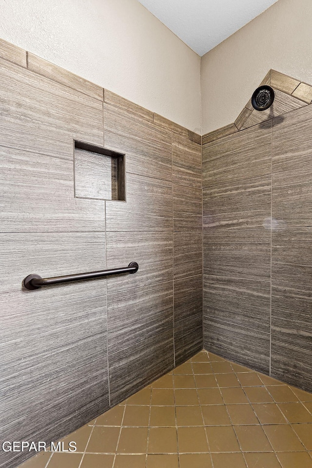 5505 Valley Cedar Dr, El Paso, TX 79932 - full bath featuring tiled shower and tile patterned flooring
