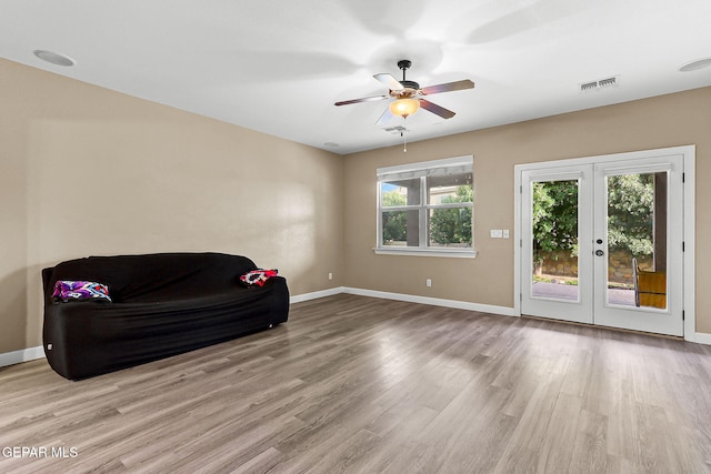 5505 Valley Cedar Dr, El Paso, TX 79932 - living area with wood finished floors, french doors, baseboards, and a ceiling fan