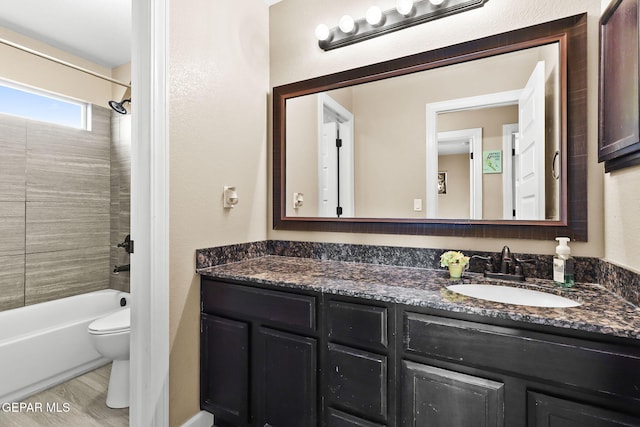 5505 Valley Cedar Dr, El Paso, TX 79932 - full bathroom with vanity, toilet, and shower / washtub combination