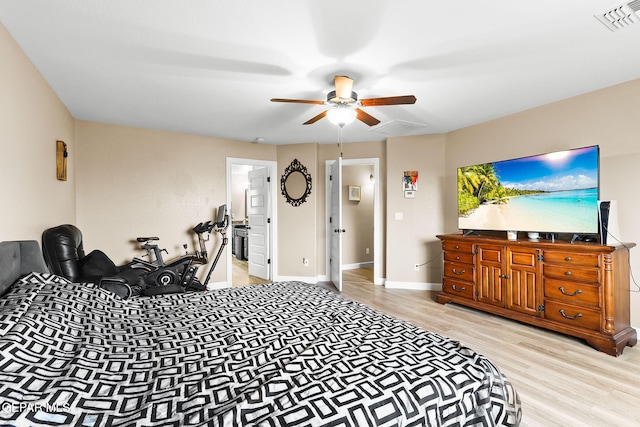 5505 Valley Cedar Dr, El Paso, TX 79932 - bedroom featuring wood finished floors, baseboards, a ceiling fan, and ensuite bathroom