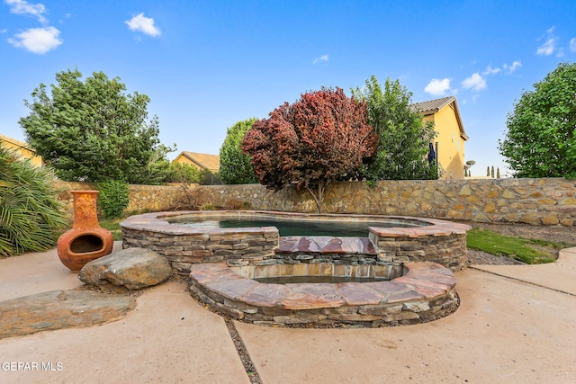5505 Valley Cedar Dr, El Paso, TX 79932 - fenced backyard with a pool with connected hot tub