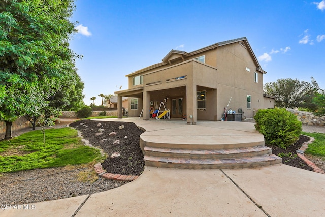 5505 Valley Cedar Dr, El Paso, TX 79932 - back of house featuring stucco siding and a patio