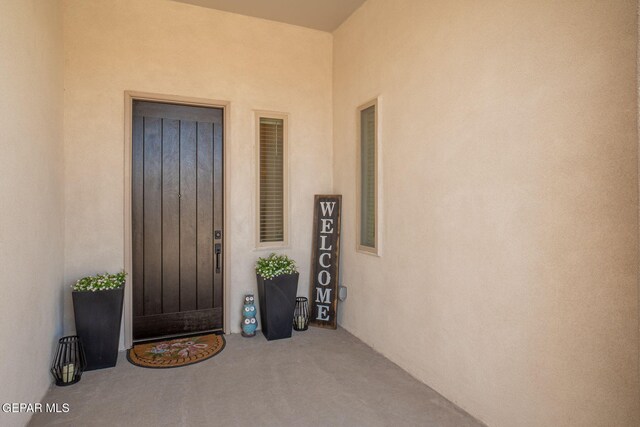 13436 Emerald Crystal Dr, El Paso, TX 79928 - view of exterior entry featuring stucco siding
