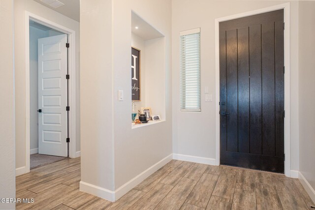 13436 Emerald Crystal Dr, El Paso, TX 79928 - foyer entrance featuring wood finished floors and baseboards