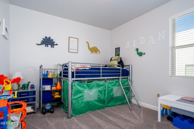 13436 Emerald Crystal Dr, El Paso, TX 79928 - carpeted bedroom featuring baseboards