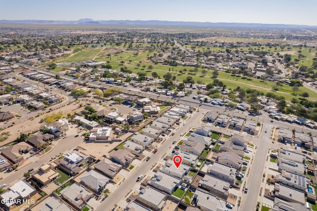 13436 Emerald Crystal Dr, El Paso, TX 79928 - aerial overview of property's location with a mountain backdrop and nearby suburban area