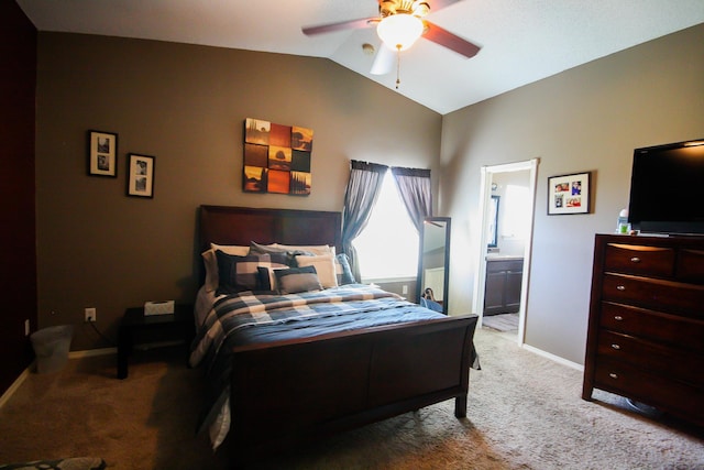 14244 Trigger Rock Ln, El Paso, TX 79938 - bedroom with vaulted ceiling, carpet floors, baseboards, ensuite bathroom, and a ceiling fan