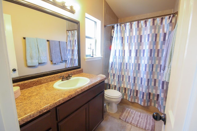 14244 Trigger Rock Ln, El Paso, TX 79938 - full bathroom featuring toilet, vanity, tile patterned flooring, and a shower with shower curtain
