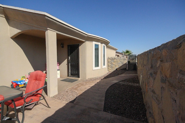 14244 Trigger Rock Ln, El Paso, TX 79938 - view of patio featuring a gate
