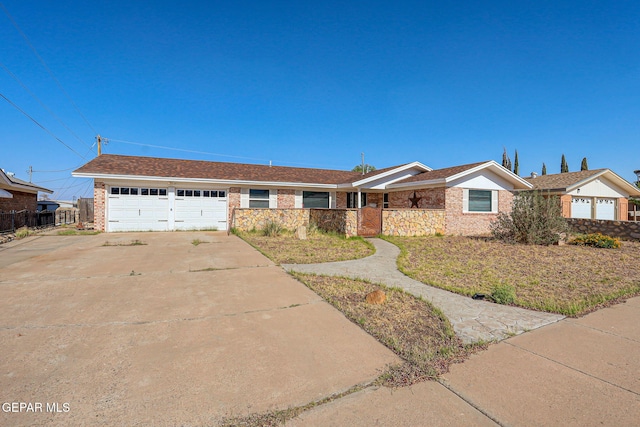 10224 Galahad Way, El Paso, TX 79924 - ranch-style house with concrete driveway, a garage, and brick siding