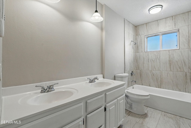 10224 Galahad Way, El Paso, TX 79924 - full bath with  shower combination, toilet, and double vanity
