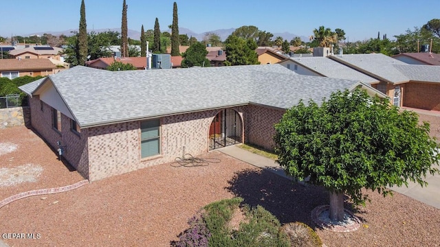 1701 Paul Moran Pl, El Paso, TX 79936 - view of front of property featuring roof with shingles and a residential view