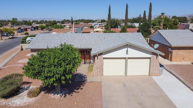 1701 Paul Moran Pl, El Paso, TX 79936 - ranch-style house with an attached garage, driveway, a residential view, and a shingled roof