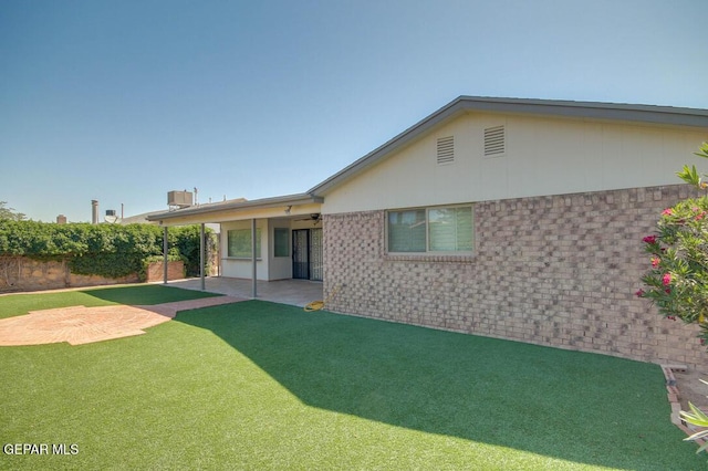 1701 Paul Moran Pl, El Paso, TX 79936 - rear view of house with a patio area