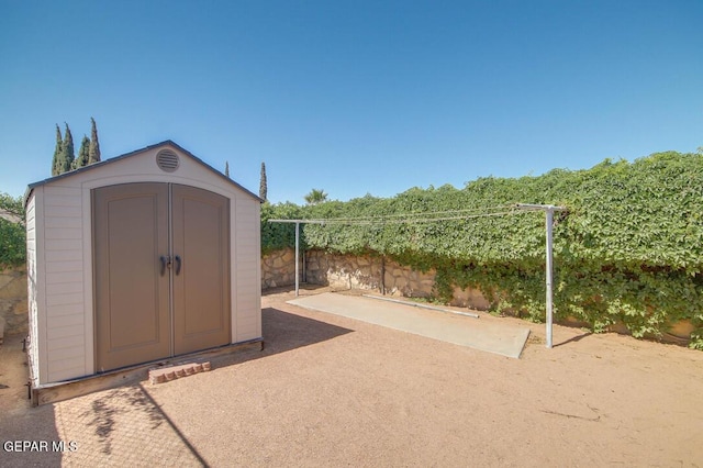 1701 Paul Moran Pl, El Paso, TX 79936 - view of shed with a fenced backyard