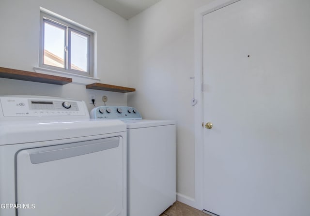 1701 Paul Moran Pl, El Paso, TX 79936 - laundry room with washer and clothes dryer, light tile patterned floors, and baseboards