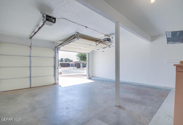 1701 Paul Moran Pl, El Paso, TX 79936 - garage featuring a garage door opener
