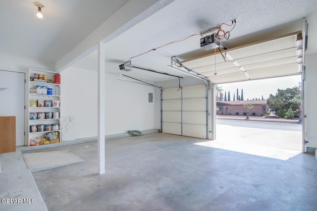 1701 Paul Moran Pl, El Paso, TX 79936 - garage featuring a garage door opener