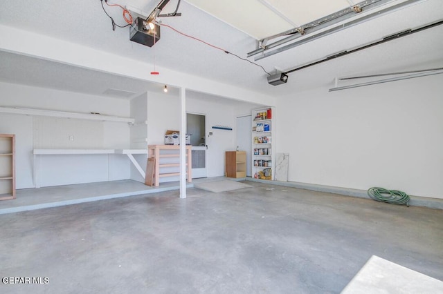 1701 Paul Moran Pl, El Paso, TX 79936 - garage with a garage door opener