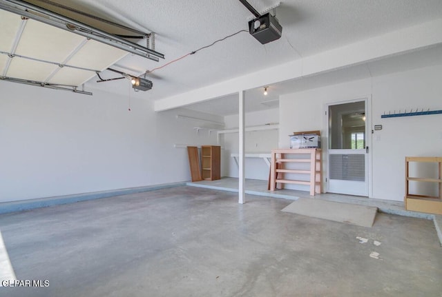 1701 Paul Moran Pl, El Paso, TX 79936 - garage featuring a garage door opener