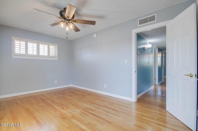 1701 Paul Moran Pl, El Paso, TX 79936 - spare room with ceiling fan, light wood-style flooring, and baseboards