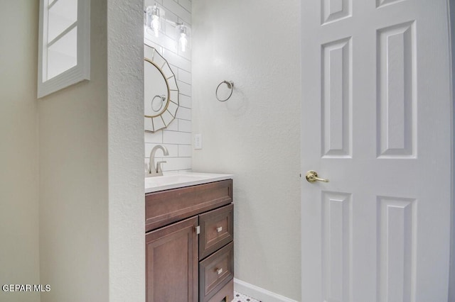 1701 Paul Moran Pl, El Paso, TX 79936 - bathroom featuring vanity and decorative backsplash