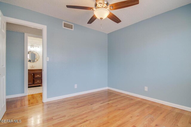 1701 Paul Moran Pl, El Paso, TX 79936 - unfurnished room featuring light wood finished floors, ceiling fan, and baseboards