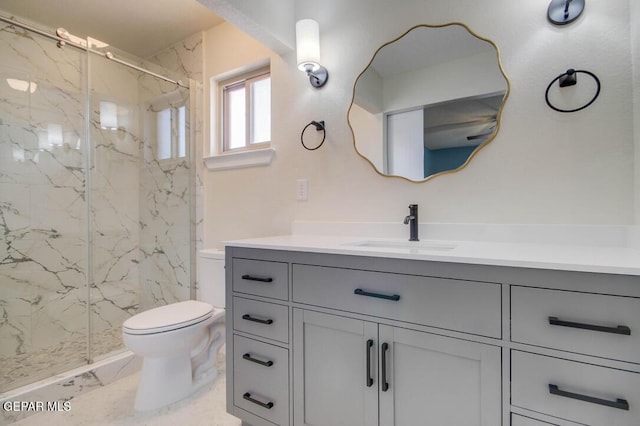 1701 Paul Moran Pl, El Paso, TX 79936 - full bathroom featuring marble look tile flooring, vanity, toilet, and a marble finish shower