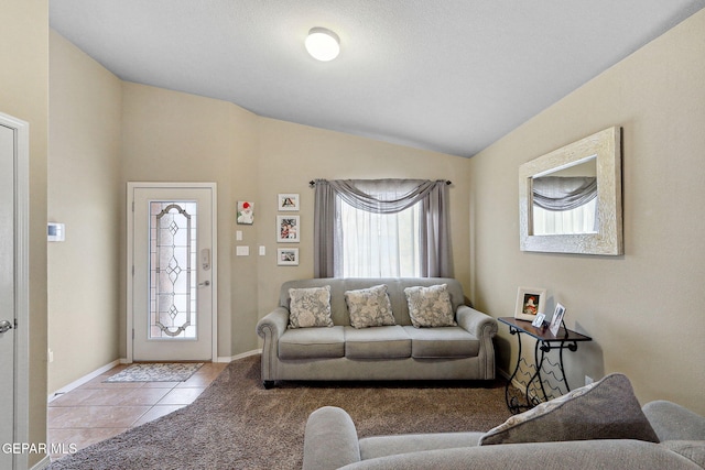 14196 Greg Allen, El Paso, TX 79938 - living area with lofted ceiling, baseboards, and tile patterned flooring