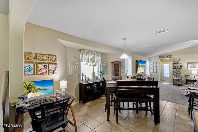 14196 Greg Allen, El Paso, TX 79938 - dining room featuring light tile patterned flooring and vaulted ceiling