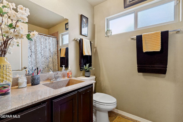 14196 Greg Allen, El Paso, TX 79938 - full bath with toilet, vanity, and healthy amount of natural light