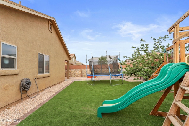 14196 Greg Allen, El Paso, TX 79938 - view of yard featuring a trampoline and a playground