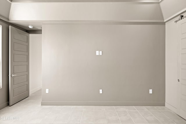 832 Acton St, Horizon City, TX 79928 - unfurnished room featuring a barn door and baseboards