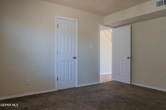 11896 Crimson Sky Dr, El Paso, TX 79936 - unfurnished bedroom with carpet and baseboards