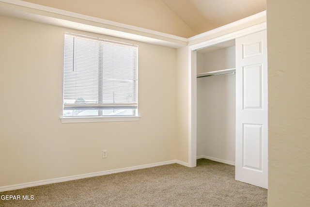 11896 Crimson Sky Dr, El Paso, TX 79936 - unfurnished bedroom with carpet flooring, a closet, lofted ceiling, and baseboards