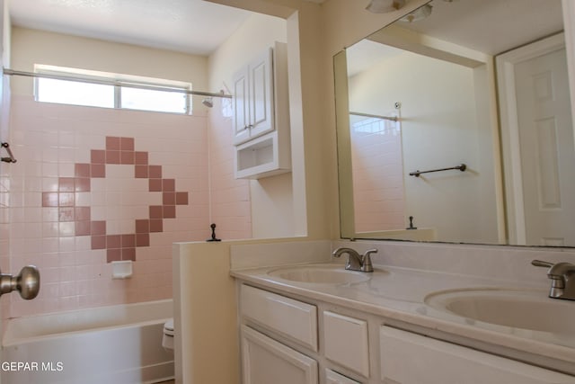 11896 Crimson Sky Dr, El Paso, TX 79936 - bathroom featuring double vanity, shower / bathtub combination, and toilet