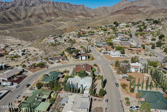 3104 Pagosa Ct, El Paso, TX 79904 - aerial view of property's location featuring a mountainous background and nearby suburban area