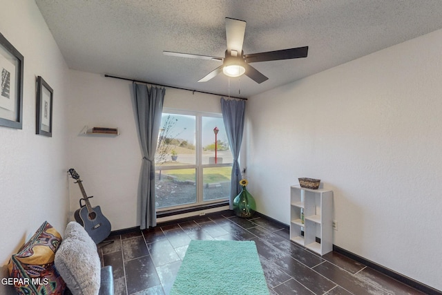 3104 Pagosa Ct, El Paso, TX 79904 - empty room with a textured ceiling, ceiling fan, baseboard heating, and baseboards
