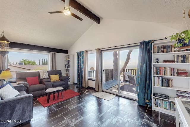 3104 Pagosa Ct, El Paso, TX 79904 - living area featuring a ceiling fan, beam ceiling, a textured ceiling, and high vaulted ceiling