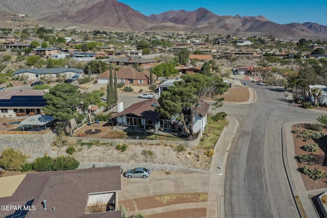 3104 Pagosa Ct, El Paso, TX 79904 - aerial overview of property's location featuring nearby suburban area and a mountainous background