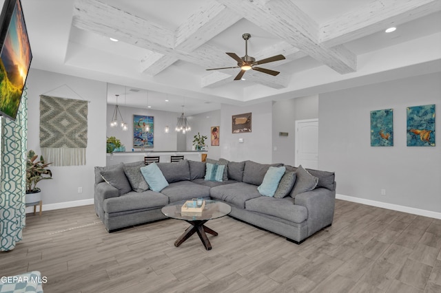 14521 Petralia Ave, El Paso, TX 79938 - living area with coffered ceiling, baseboards, light wood finished floors, a chandelier, and a ceiling fan